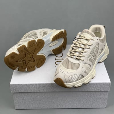 Dior Chrono sneaker features a white technical mesh upper