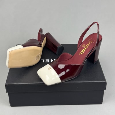 Chanel Leather Square Toe Turn Lock CC Runway Pumps in a burgundy and white
