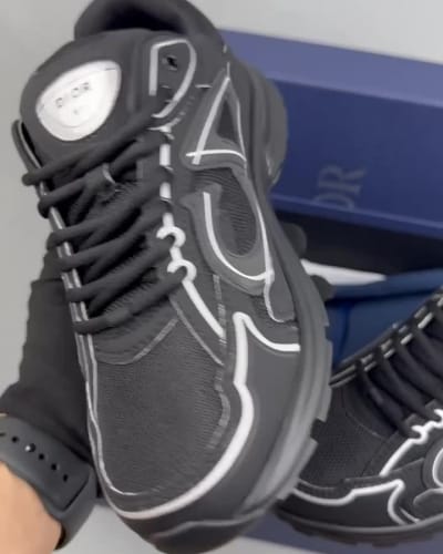 Dior B30 sneakers in black, featuring technical mesh and a reflective CD30 signature — 5