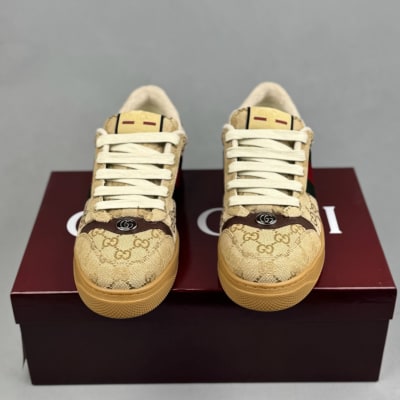 Gucci Women's Screener sneaker in beige and ebony GG canvas — 4