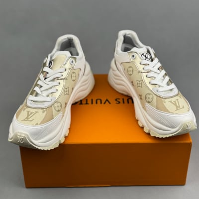 Louis Vuitton Run 55 sneakers in a white and gold monogram canvas design — 4