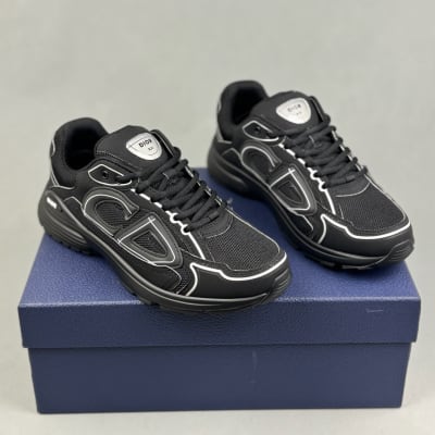 Dior B30 sneakers in black, featuring technical mesh and a reflective CD30 signature — 3