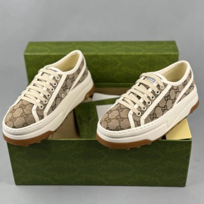 Gucci GG Canvas Sneakers in beige and white