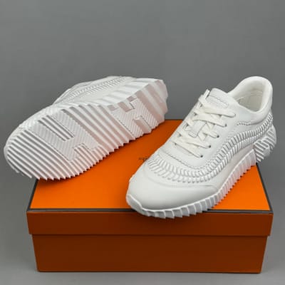 Hermès Bouncing sneakers, crafted from braided calfskin leather