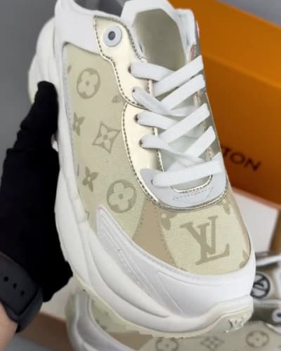 Louis Vuitton Run 55 sneakers in a white and gold monogram canvas design — 5