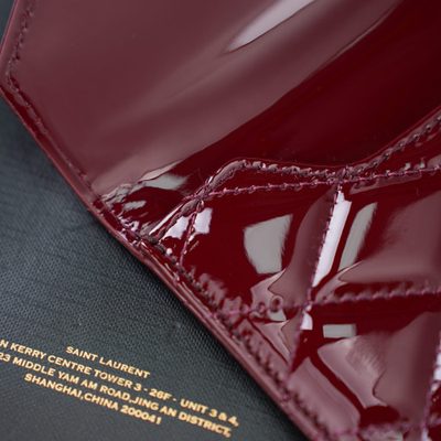 Saint Laurent Paris Matelassé Patent-Leather Clutch — 10