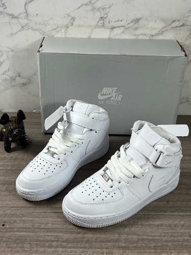 Nike Air Force 1 Mid '07 sneakers in a white colorway — 3