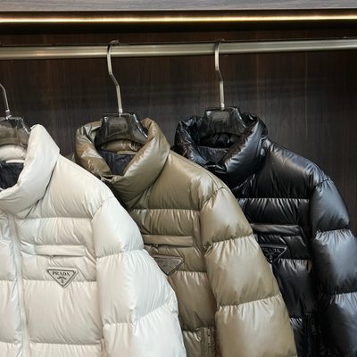 Prada shiny nylon puffer jacket — 14