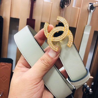 Chanel belt features a distinctive double-C buckle — 7