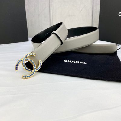 Chanel belt features a distinctive light gray leather strap and a CC logo buckle — 8