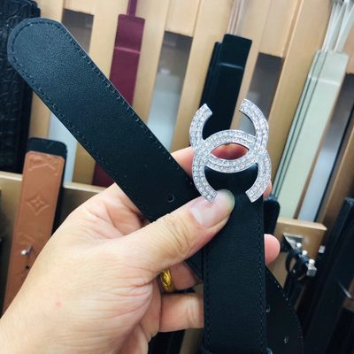 Chanel belt features a distinctive double-C buckle — 6