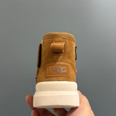 UGG-branded platform or utility-style ankle boots — 6
