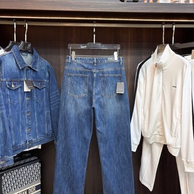 Gucci blue denim trucker jacket and matching relaxed-fit blue jeans — 4