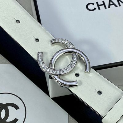Chanel belt features white cowhide leather and a gold-tone CC buckle — 6