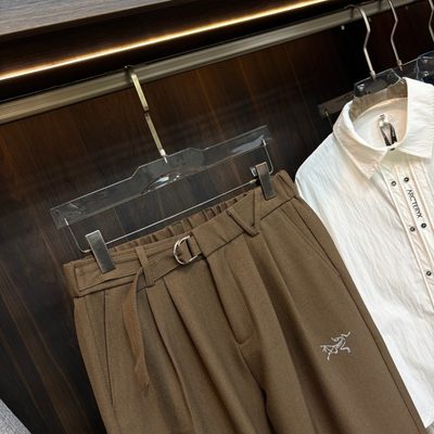 Arcteryx brown matching set featuring a zip-up jacket and wide-leg trousers — 9