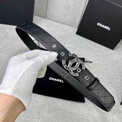 Chanel quilted leather belt featuring a prominent interlocking gold-tone CC buckle — 6
