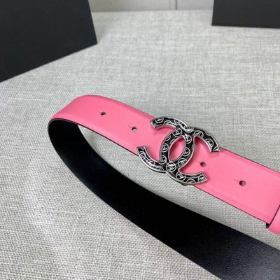 Chanel leather belt features a vibrant pink strap paired with a gold-tone CC buckle — 8