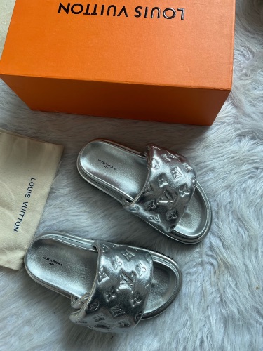Louis Vuitton silver monogram revival embossed leather slides