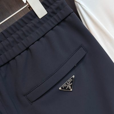 Prada technical fabric zip-up jacket and matching trousers set — 9