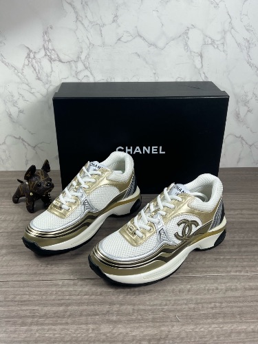 Chanel CC Runner sneakers in a white, gold, and silver — 3
