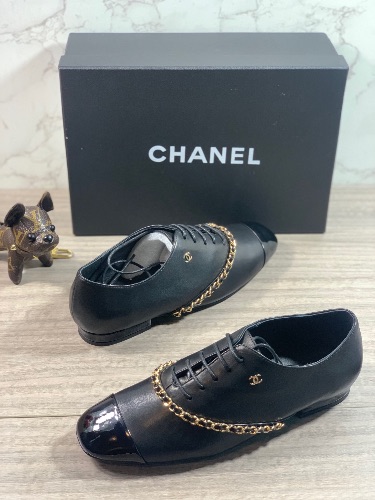 Chanel black leather lace-up oxford shoes