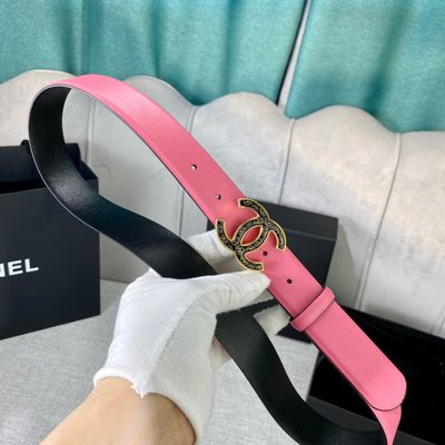Chanel leather belt features a vibrant pink strap paired with a gold-tone CC buckle — 5