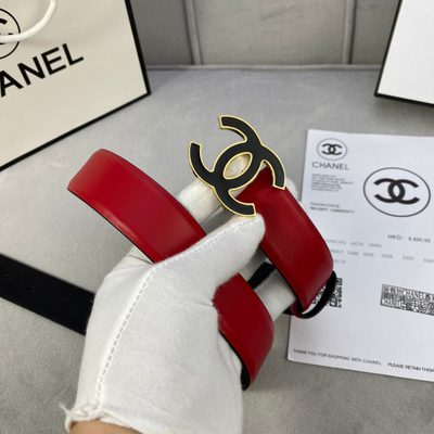 Chanel belt featuring a prominent black and silver interlocking CC logo buckle — 6