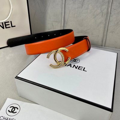 Chanel women's belt features a vibrant orange leather strap paired with a silver-tone, rhinestone-em — 6