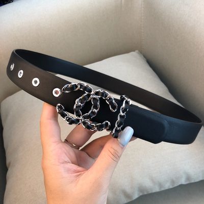 Chanel belt features a black leather strap and a silver chain interlocking CC logo buckle — 4