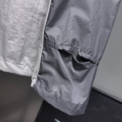 Arc'teryx Norvan Windshell Hoody in a gray and silver — 5