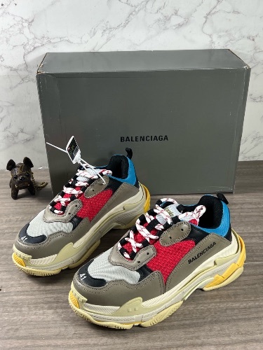 Balenciaga Triple S sneakers in a blue, red, and grey — 3