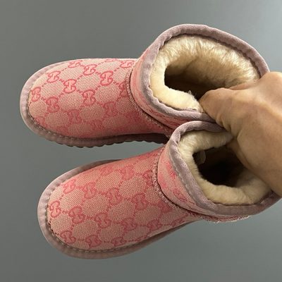 Gucci GG Monogram mini boots