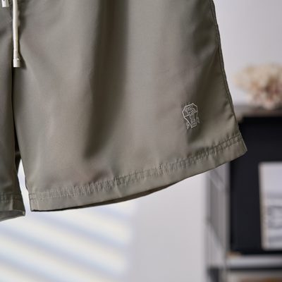 Brunello Cucinelli sage green swim shorts — 8