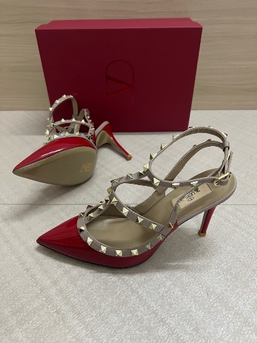 Valentino Garavani Rockstud patent leather t-strap pumps