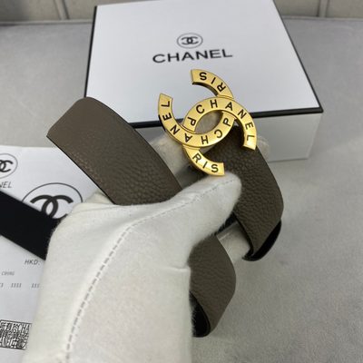 Chanel belt features a taupe, caviar-textured leather strap and a distinctive gold-tone logo buckle — 3