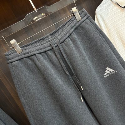 Balenciaga long-sleeve polo-collar sweatshirt and relaxed-fit trousers — 9