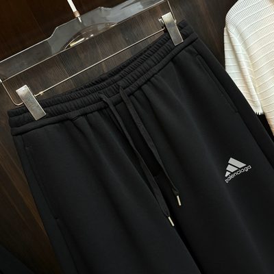Balenciaga long-sleeve polo-collar sweatshirt and relaxed-fit trousers — 9