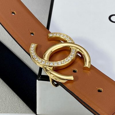 Chanel belt features tan brown leather and a silver CC logo buckle — 4