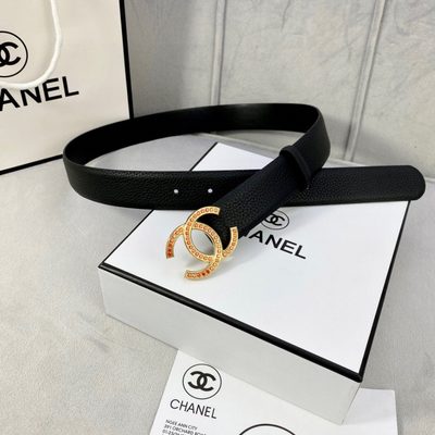 Chanel belt features a black grained leather strap and a gold-tone CC buckle embellished with orange — 3