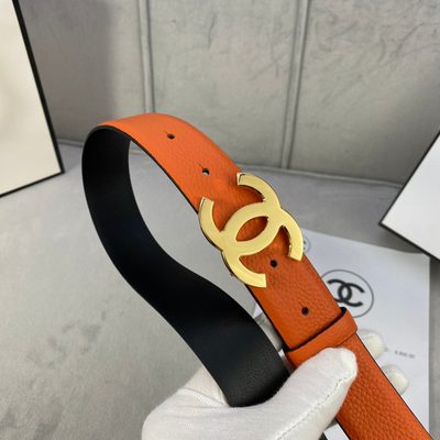 Chanel belt is crafted from orange grained calfskin leather and features a gold-tone interlocking CC — 3