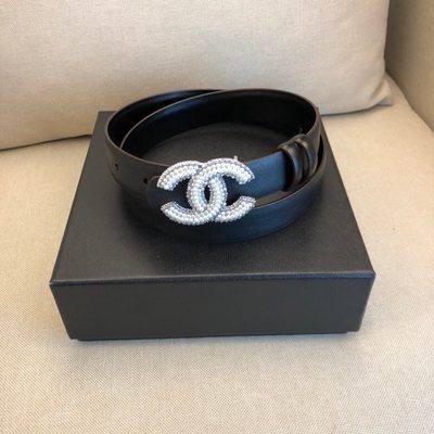 Chanel black leather belt featuring a prominent CC logo buckle — 4