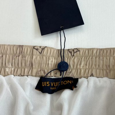 Louis Vuitton beige Monogram swim shorts — 9