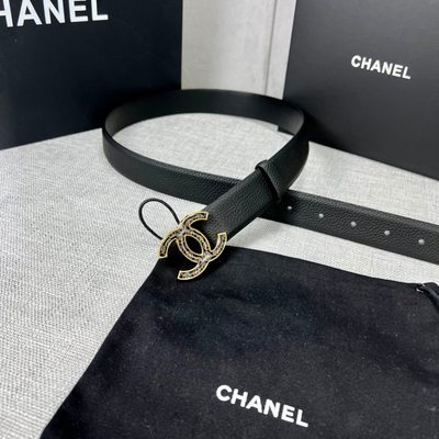 Chanel Interlocking CC Logo design featuring a distinctive patterned silver hardware buckle — 9
