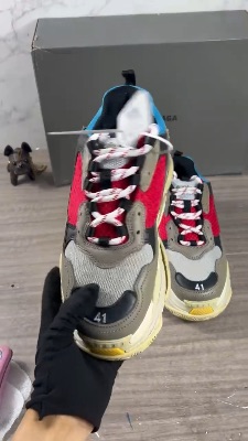 Balenciaga Triple S sneakers in a blue, red, and grey — 5