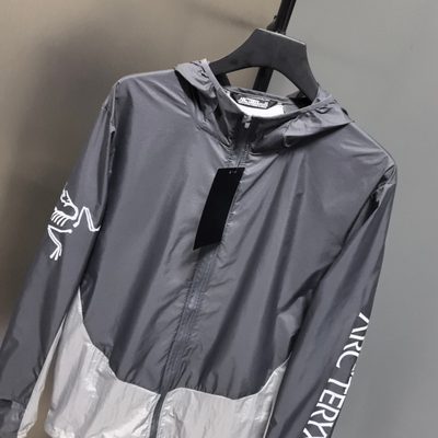 Arc'teryx Norvan Windshell Hoody in a gray and silver — 7