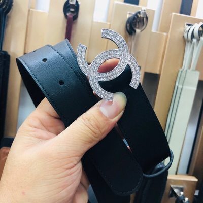 Chanel belt features a distinctive double-C buckle — 5