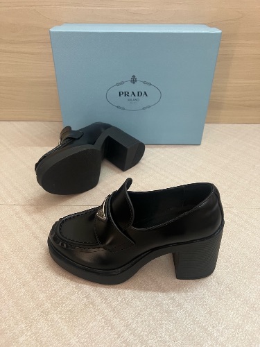 Prada Chocolate brushed leather loafers in black