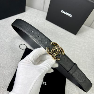 Chanel Interlocking CC Logo design featuring a distinctive patterned silver hardware buckle — 6