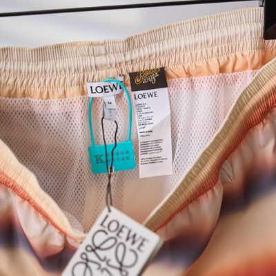 Loewe Paula's Ibiza striped swim trunks — 9