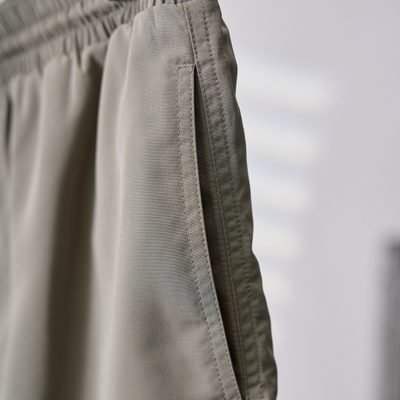 Brunello Cucinelli sage green swim shorts — 6